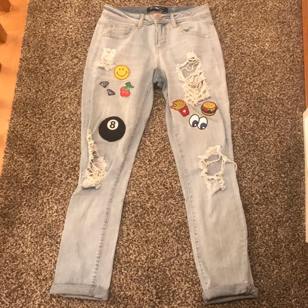 These ripped jeans with patches